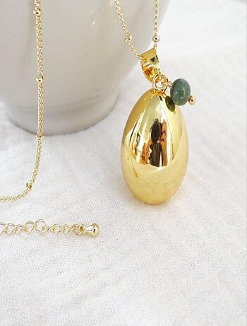 Bola de grossesse goutte or, Mai Emeraude