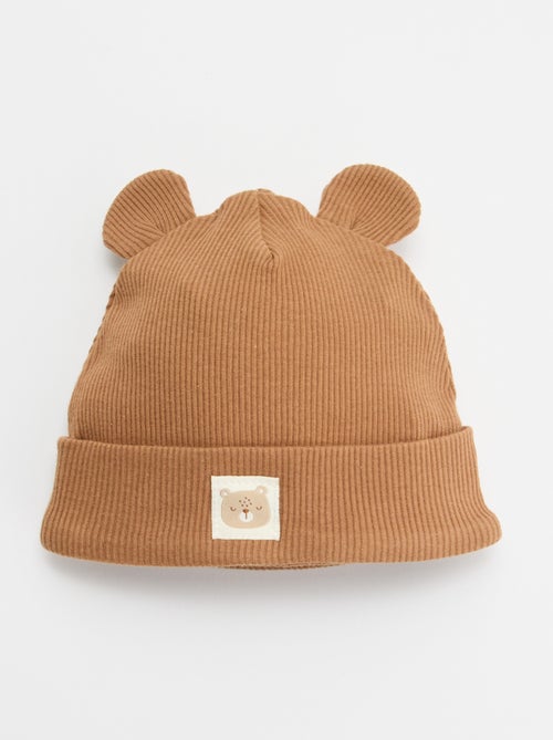 Bonnet côtelé avec oreilles - Kiabi Bonnet côtelé avec oreilles - Kiabi