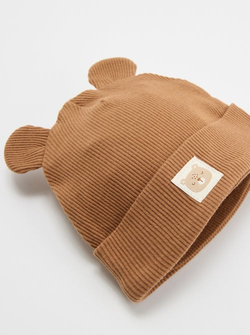 Bonnet côtelé avec oreilles - Kiabi Bonnet côtelé avec oreilles - Kiabi