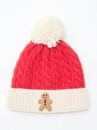 Bonnet côtelé et torsadé avec pompon