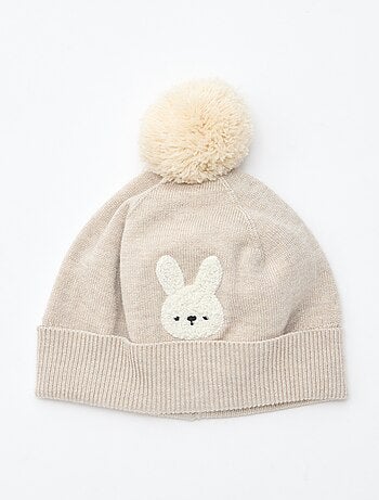 Bonnet maillé à pompon