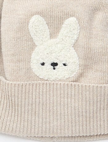 Bonnet maillé à pompon