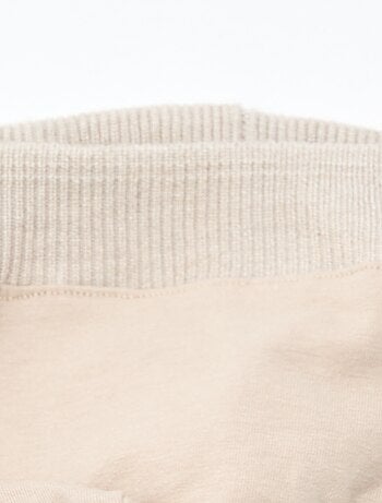 Bonnet maillé à pompon