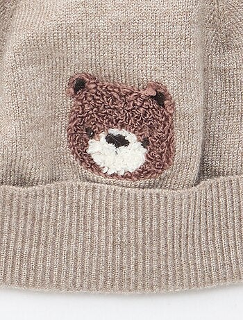 Bonnet maillé à pompon