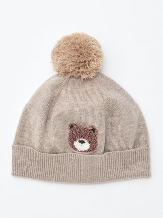 Bonnet maillé à pompon