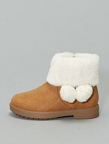 Boots avec revers fausse fourrure