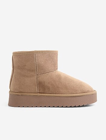 Boots fourrées à semelle compensée