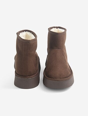 Boots fourrées à semelle compensée