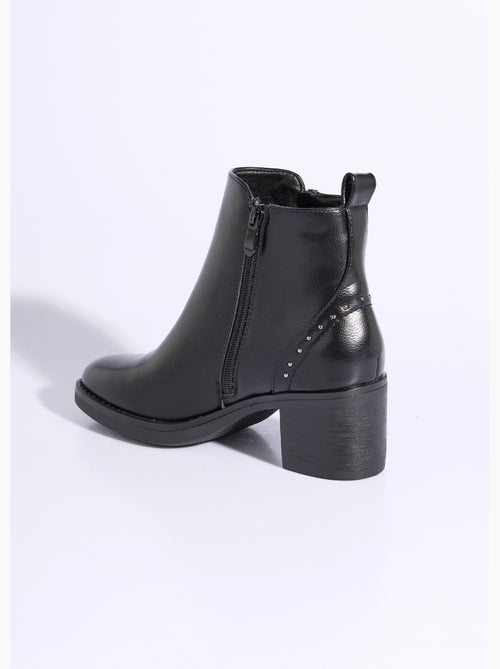 Boots zippées à talon détails cloutés - afibel - Kiabi Boots zippées à talon détails cloutés - afibel - Kiabi