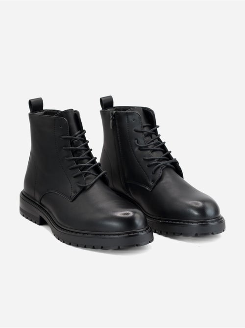 Bottines à semelles crantées - Kiabi Bottines à semelles crantées - Kiabi