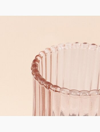 Bougeoir en verre strié rose 19cm