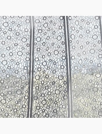Brise-bise en maille aux cercles ajourés