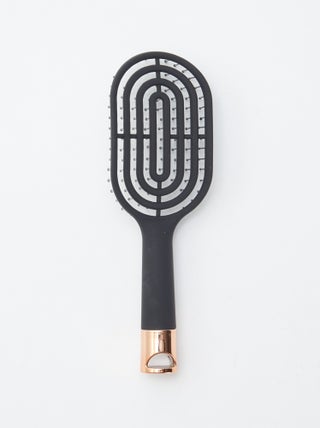 Brosse à cheveux spirale avec détail irisé