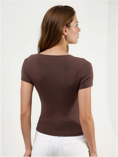 Busem t-shirt élastique à manches courtes avec col en v - Kiabi Busem t-shirt élastique à manches courtes avec col en v - Kiabi