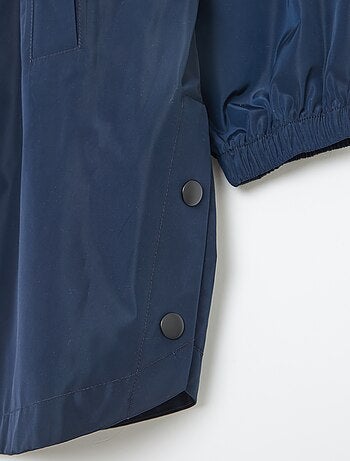 Cape de pluie à capuche