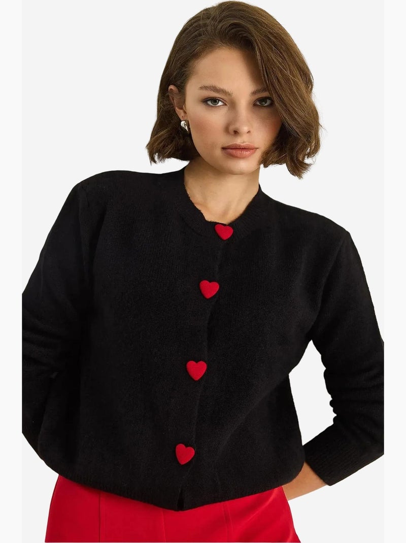 Cardigan en tricot à boutons en forme de cœur lucci Noir - Kiabi