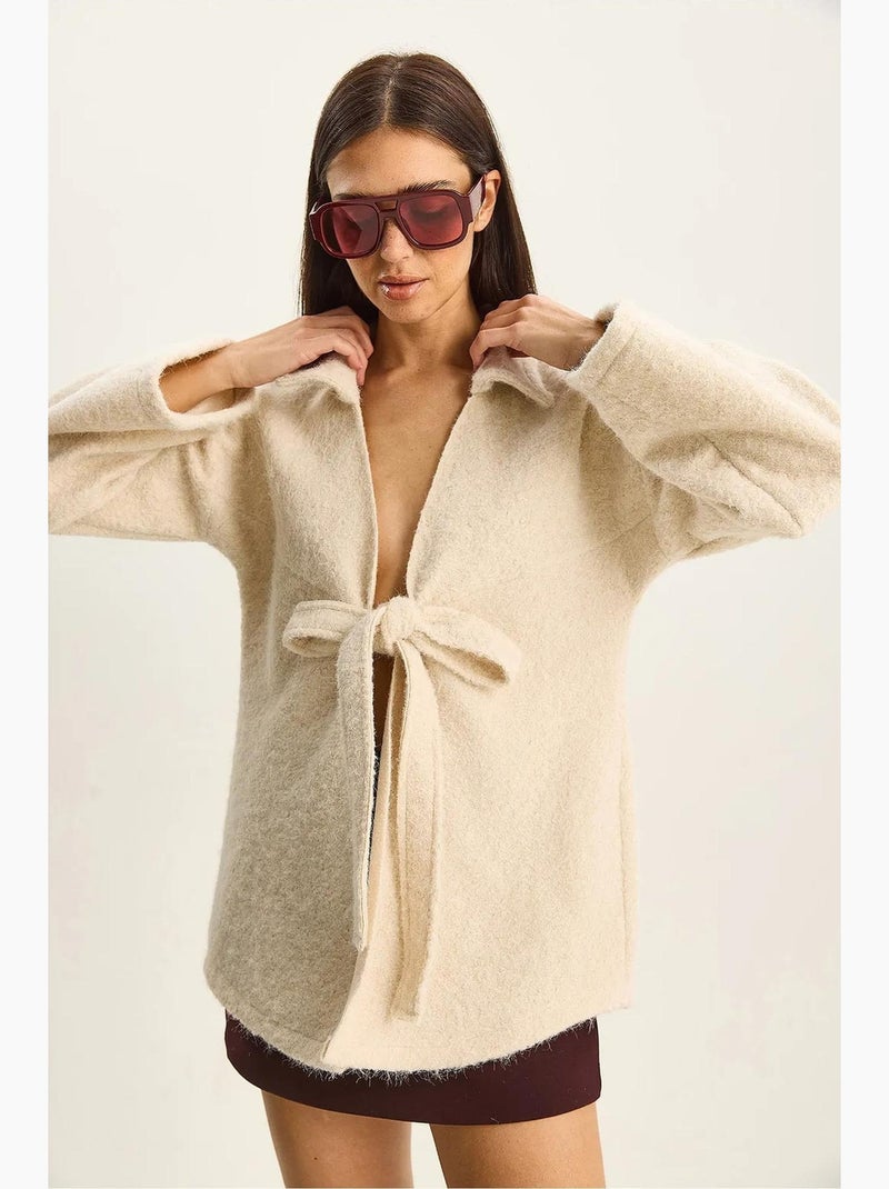 Cardigan texturé surdimensionné à col en v et fermeture à nouer avec fausse fourrure lucci Ivoire - Kiabi