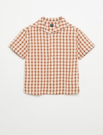 Chemise à carreaux et manches courtes