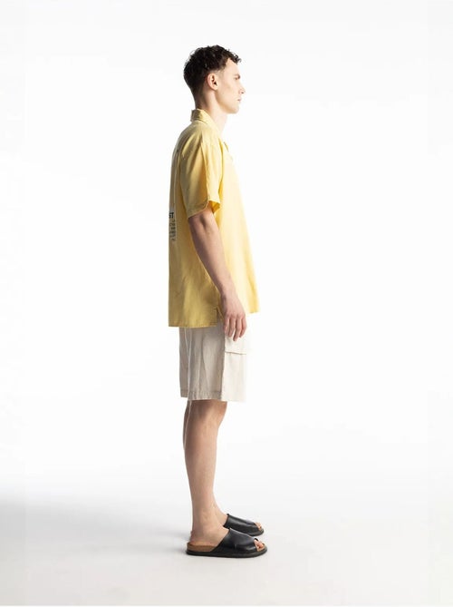 Chemise à manches courtes boutonnée en lin mélangé avec poche giesto - Kiabi Chemise à manches courtes boutonnée en lin mélangé avec poche giesto - Kiabi