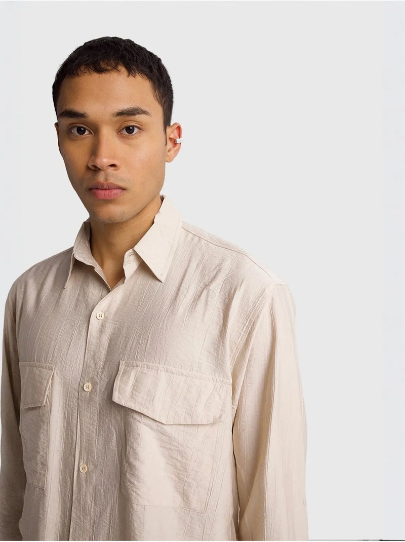 Chemise à manches longues boutonnée en gabardine avec poche giesto Beige argile - Kiabi