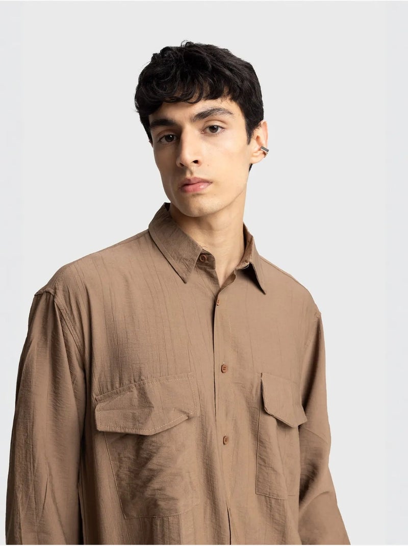 Chemise à manches longues boutonnée en gabardine avec poche giesto Grège - Kiabi