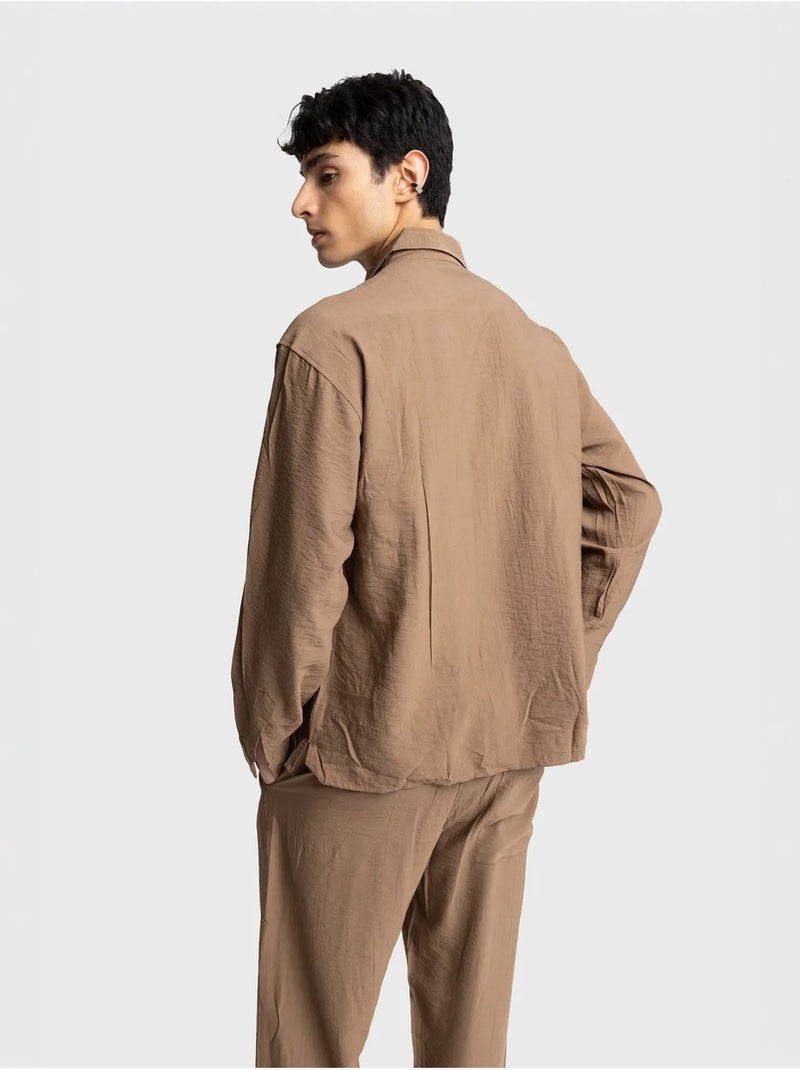 Chemise à manches longues boutonnée en gabardine avec poche giesto Grège - Kiabi