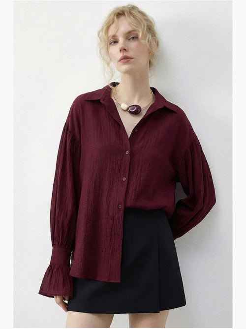 Chemise à volants oversize lucci - Kiabi Chemise à volants oversize lucci - Kiabi