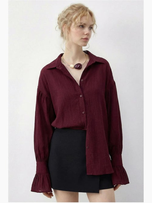 Chemise à volants oversize lucci - Kiabi Chemise à volants oversize lucci - Kiabi