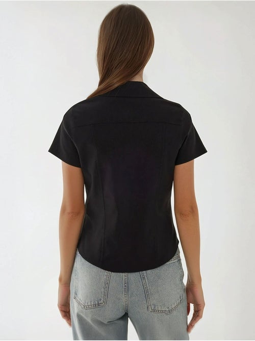 Chemise boutonnée à manches courtes coupe classique - Kiabi Chemise boutonnée à manches courtes coupe classique - Kiabi