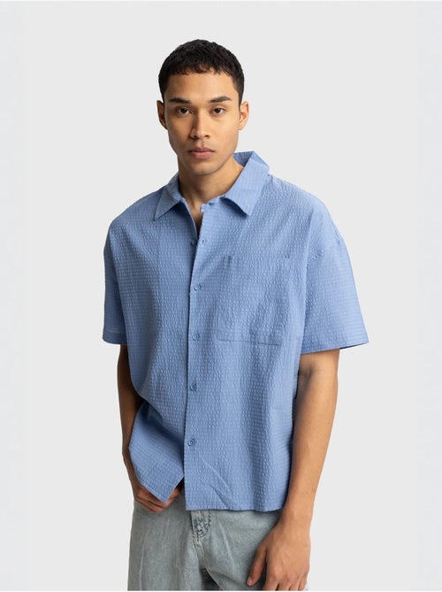 Chemise boutonnée en coton texturé avec poche giesto - Kiabi