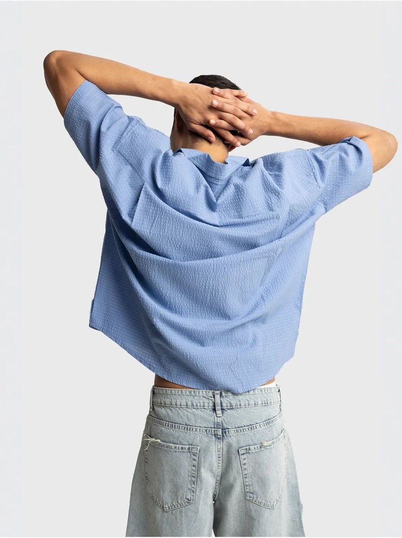 Chemise boutonnée en coton texturé avec poche giesto Bleu clair - Kiabi