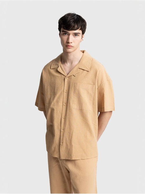 Chemise boutonnée en coton texturé avec poche giesto - Kiabi