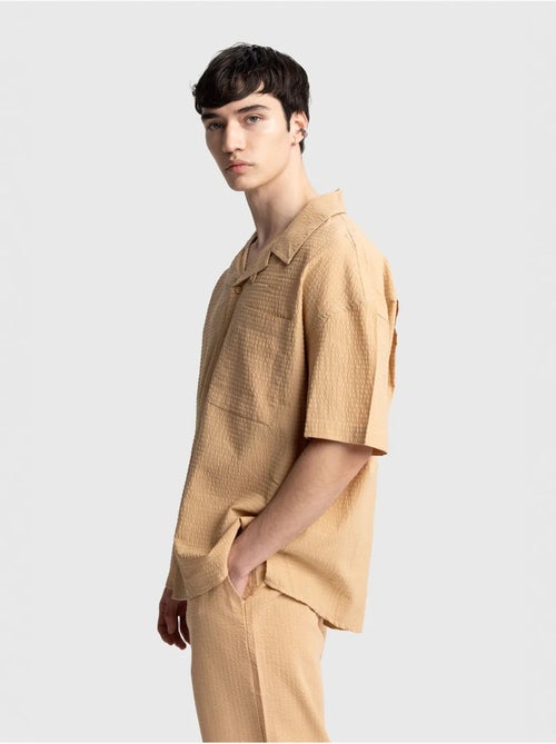 Chemise boutonnée en coton texturé avec poche giesto - Kiabi