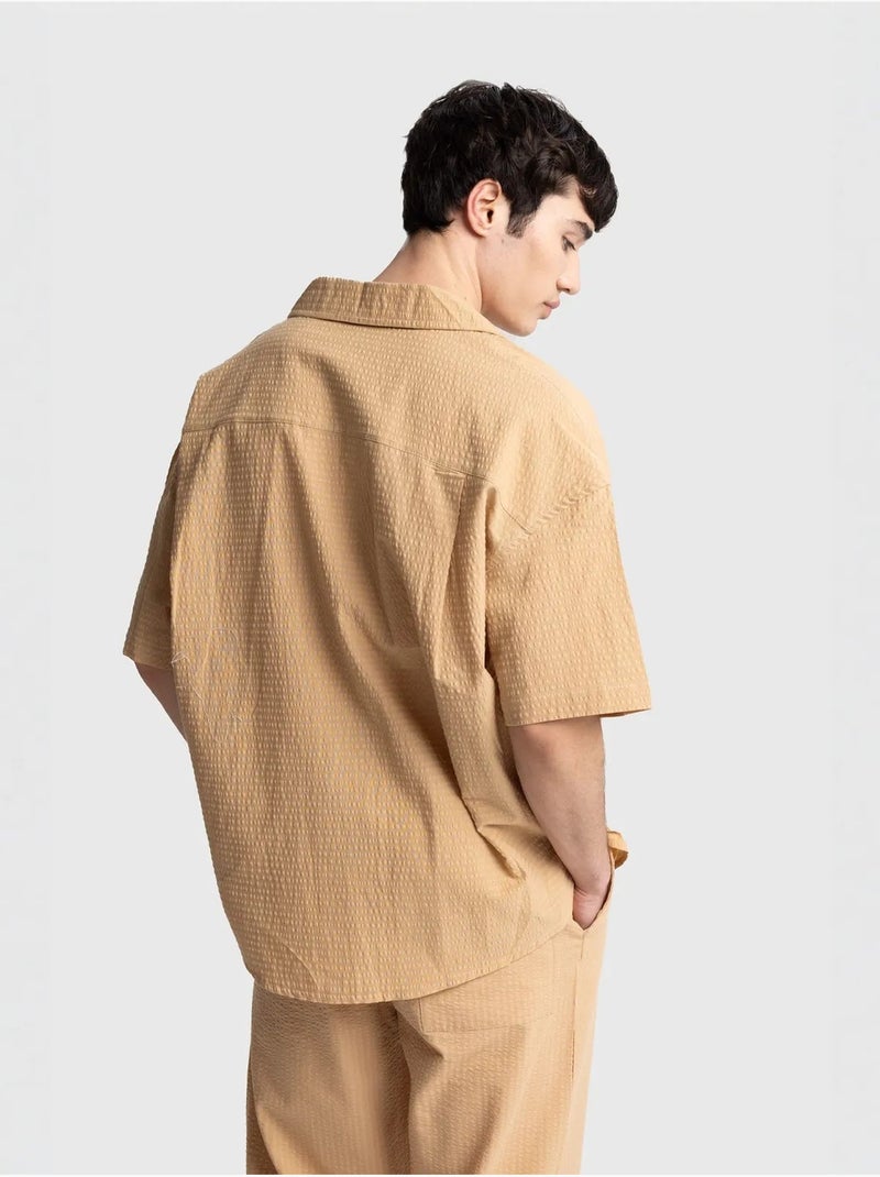 Chemise boutonnée en coton texturé avec poche giesto Grège - Kiabi