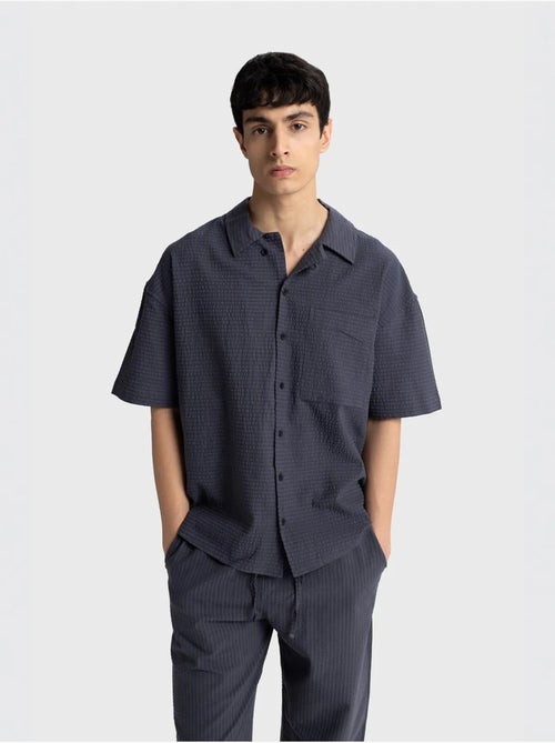 Chemise boutonnée en coton texturé avec poche giesto - Kiabi