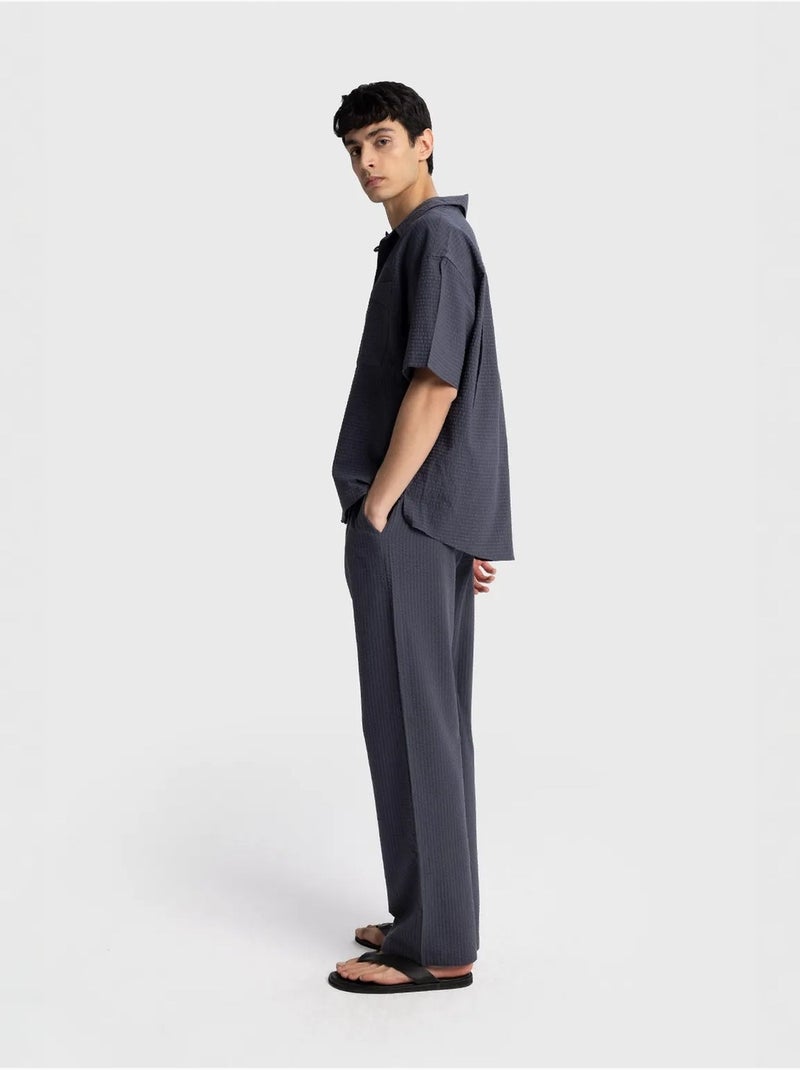Chemise boutonnée en coton texturé avec poche giesto Gris Noir - Kiabi