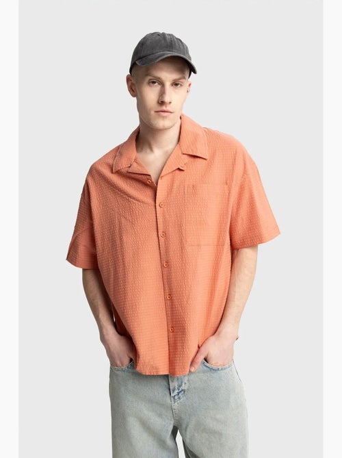 Chemise boutonnée en coton texturé avec poche giesto - Kiabi