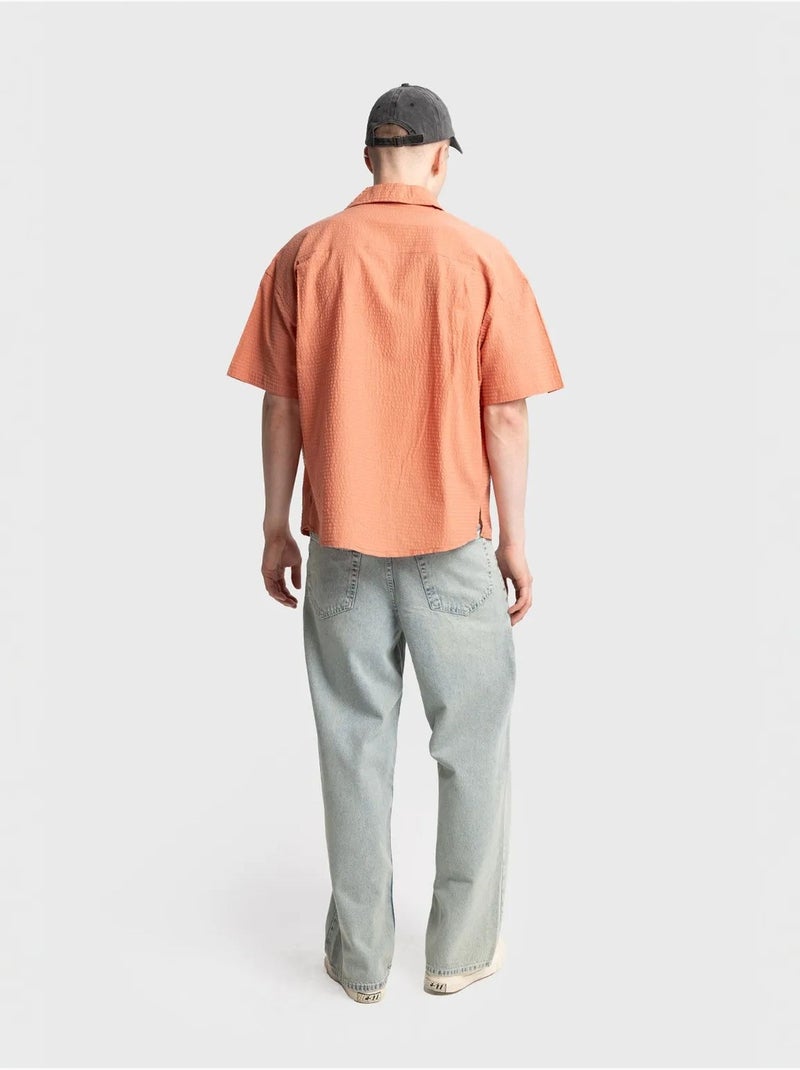 Chemise boutonnée en coton texturé avec poche giesto Orange clair - Kiabi