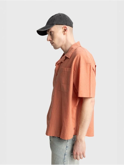 Chemise boutonnée en coton texturé avec poche giesto - Kiabi