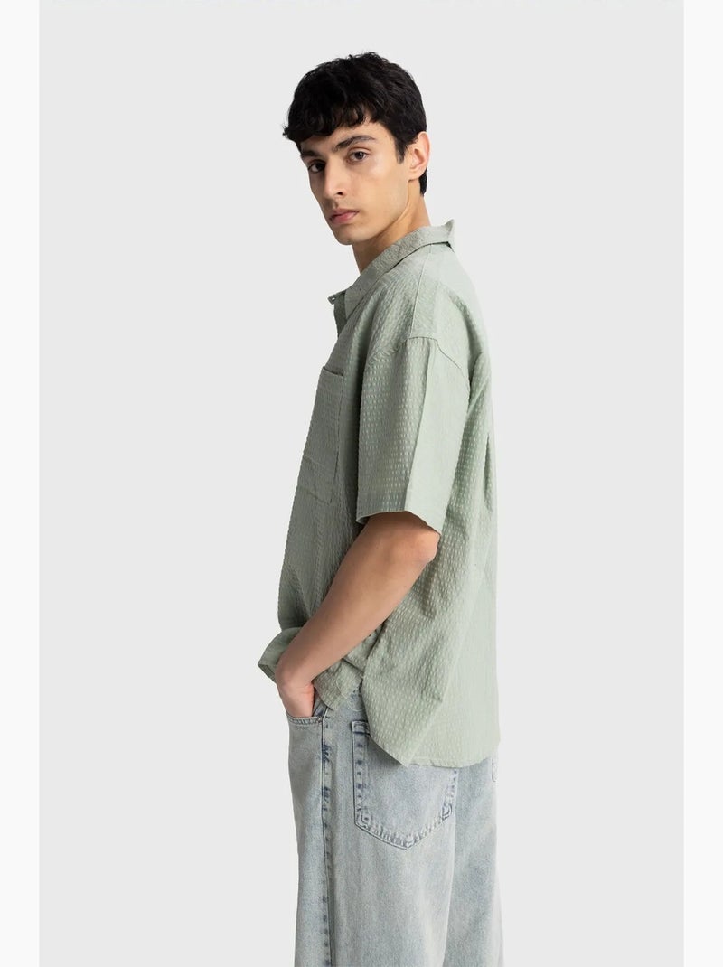 Chemise boutonnée en coton texturé avec poche giesto Vert menthe - Kiabi