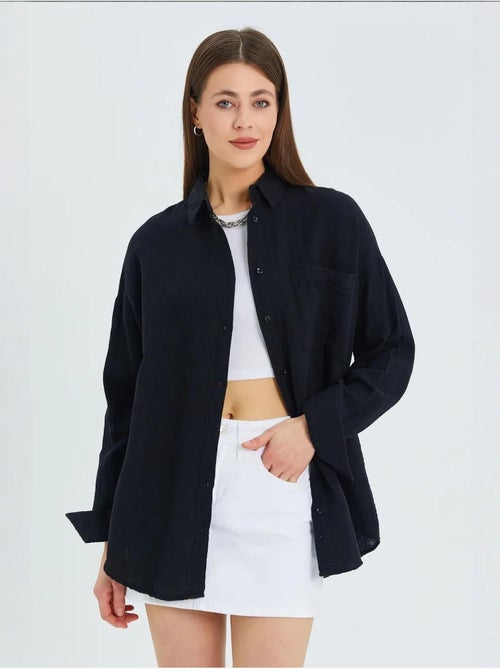 Chemise boutonnée en coton texturé avec poche mixray - Kiabi Chemise boutonnée en coton texturé avec poche mixray - Kiabi