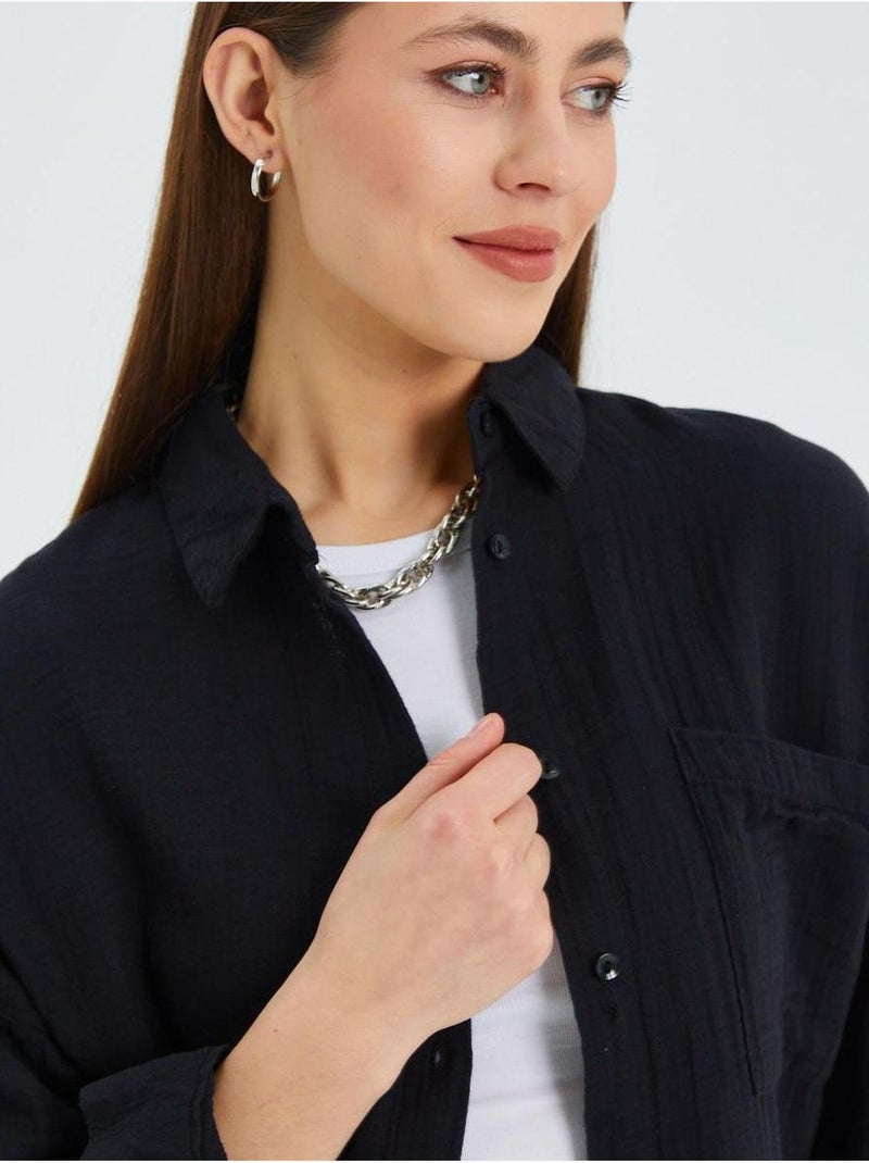 Chemise boutonnée en coton texturé avec poche mixray Noir - Kiabi