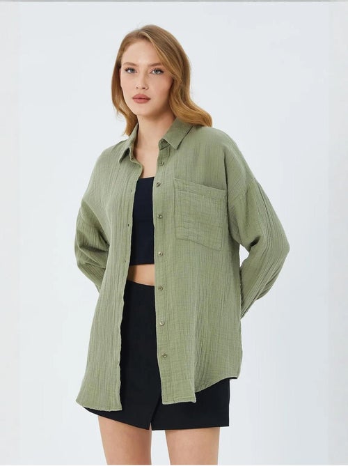 Chemise boutonnée en coton texturé avec poche mixray - Kiabi Chemise boutonnée en coton texturé avec poche mixray - Kiabi