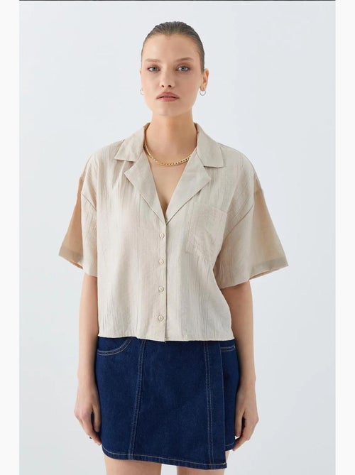 Chemise courte boutonnée coupe ample avec poche mixray - Kiabi Chemise courte boutonnée coupe ample avec poche mixray - Kiabi