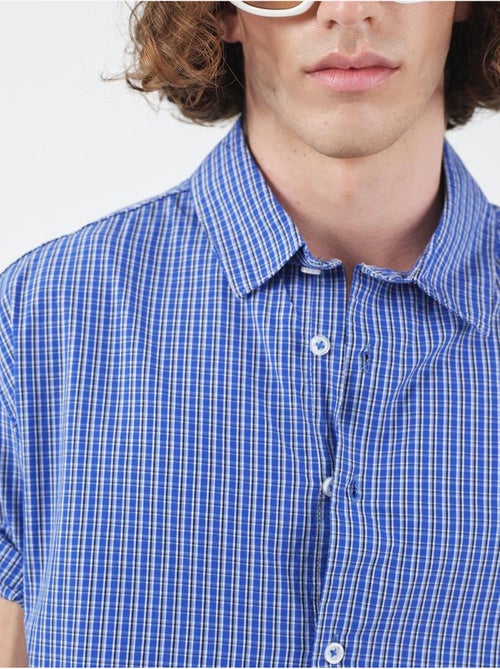 Chemise décontractée à carreaux boutonnée à manches courtes giesto - Kiabi Chemise décontractée à carreaux boutonnée à manches courtes giesto - Kiabi