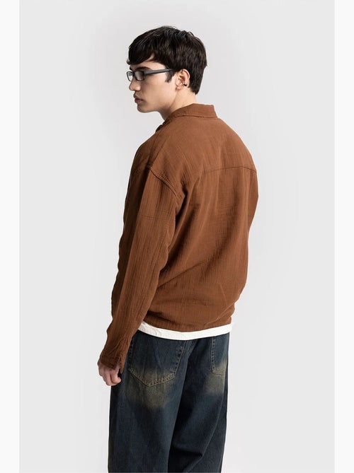 Chemise en coton à manches longues coupe décontractée avec détail nouée giesto - Kiabi Chemise en coton à manches longues coupe décontractée avec détail nouée giesto - Kiabi