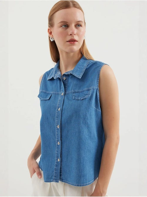 Chemise en denim sans manches en coton bdart - Kiabi Chemise en denim sans manches en coton bdart - Kiabi