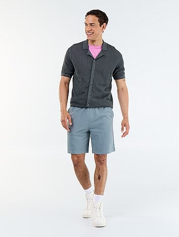 Chemise en matière ajourée à manches courtes