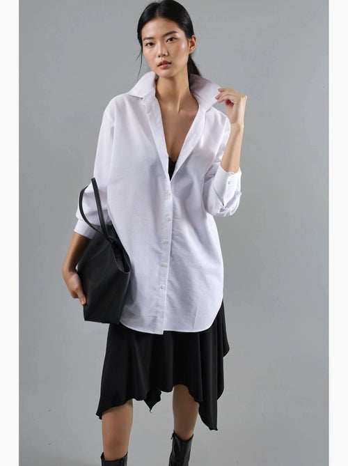 Chemise en popeline à manches longues et boutons busem - Kiabi Chemise en popeline à manches longues et boutons busem - Kiabi