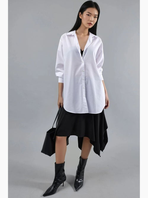 Chemise en popeline à manches longues et boutons busem - Kiabi Chemise en popeline à manches longues et boutons busem - Kiabi